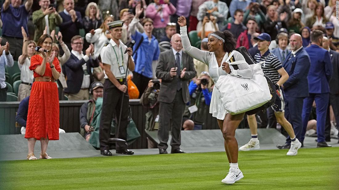 Serena waves to fans after she lost in the first round of Wimbledon in June.