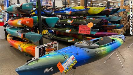 Prices for petroleum-based products like these kayaks on display at Joe's Sporting Goods in St. Paul, Minnesota, are expected to rise further due to the Russian invasion of Ukraine.