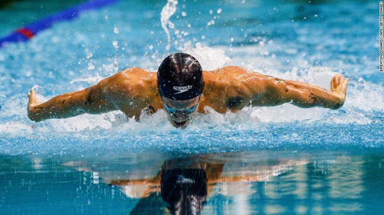 Cody Simpson competes in a men&#39;s 100m butterfly heat at last year&#39;s Australian Olympic trials.