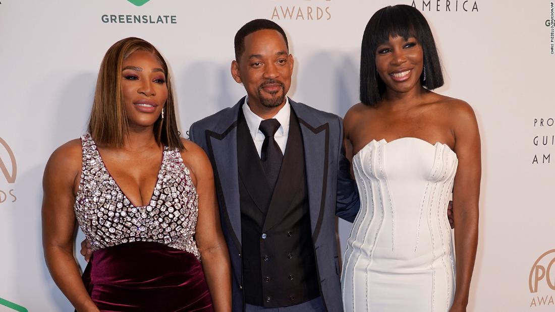 Williams is joined by her sister Venus and &quot;King Richard&quot; star Will Smith at the Producers Guild Awards in March.
