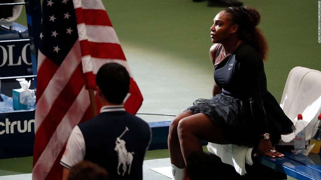 Williams waits for the trophy ceremony after she lost to Naomi Osaka in the US Open final in 2018.
