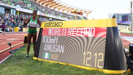 Amusan of poses with her world record in the Women&#39;s 100m hurdles semi-final on day ten of the World Athletics Championships.