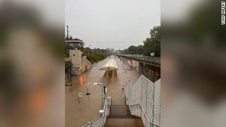 Water covers much of MetroLink's Forest Park-DeBaliviere station in St. Louis on Tuesday morning.