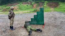 Volunteers participate in a four-week training course in Primorsky Krai, in Russia's Far East, learning how to shoot and other basic military skills.