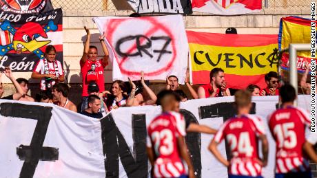Atlético Madrid supporters display a sign against Cristiano Ronaldo joining the club.