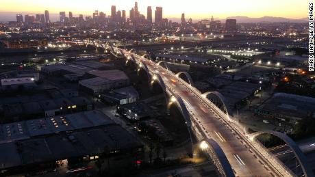 An aerial view of vehicles passing over the newly-opened 6th Street Viaduct in Los Angeles.