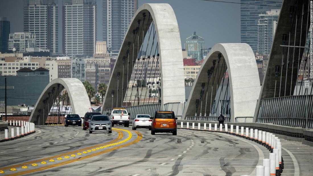 Street takeovers and wheelie contests force closures on iconic Los Angeles bridge LAPD says – CNN