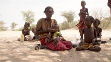 A mother feeding her malnourished child in Ileret, northern Kenya.