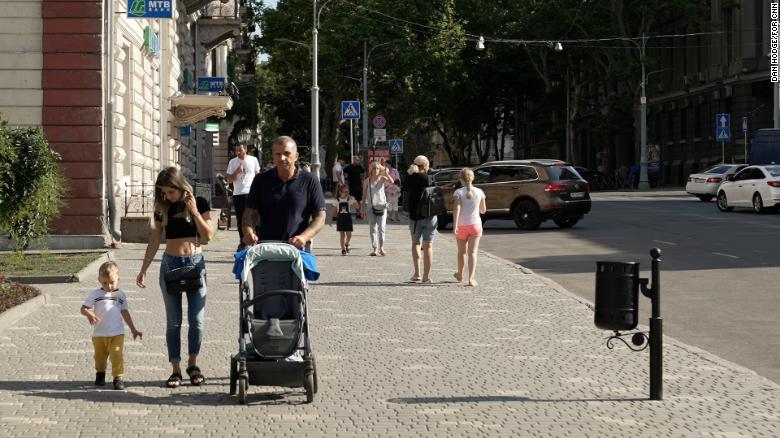 Five months into the war, many Ukrainians are embracing normal life. People still go to work, walk their dogs and play with their children in the park. 