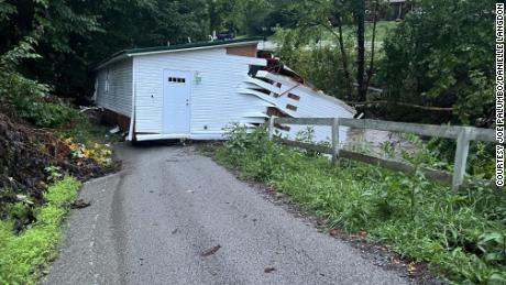 A house was washed away by floodwaters in Kentucky.