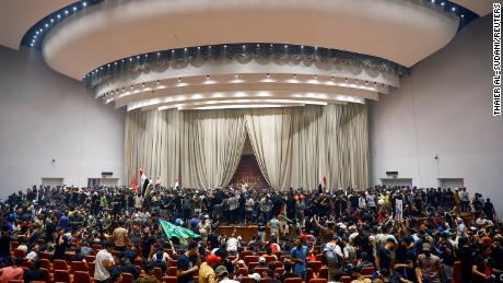 Demonstrators, seen here on July 30, have breached Baghdad&#39;s heavily fortified Green Zone for the second time this week. 