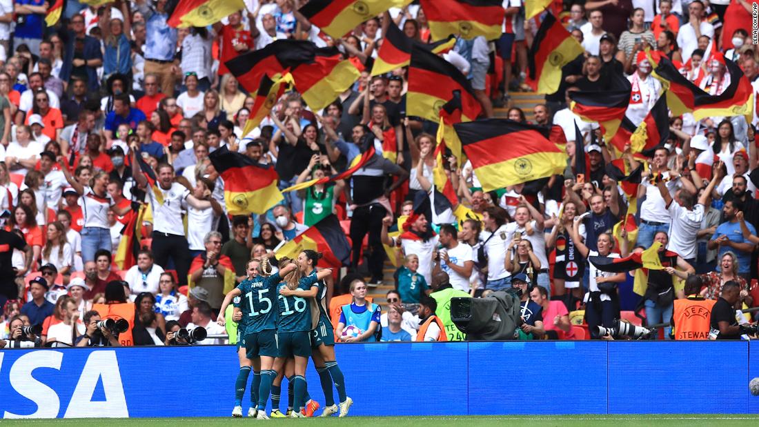 Germany&#39;s players celebrate their equalizing goal, scored by Lina Magull.