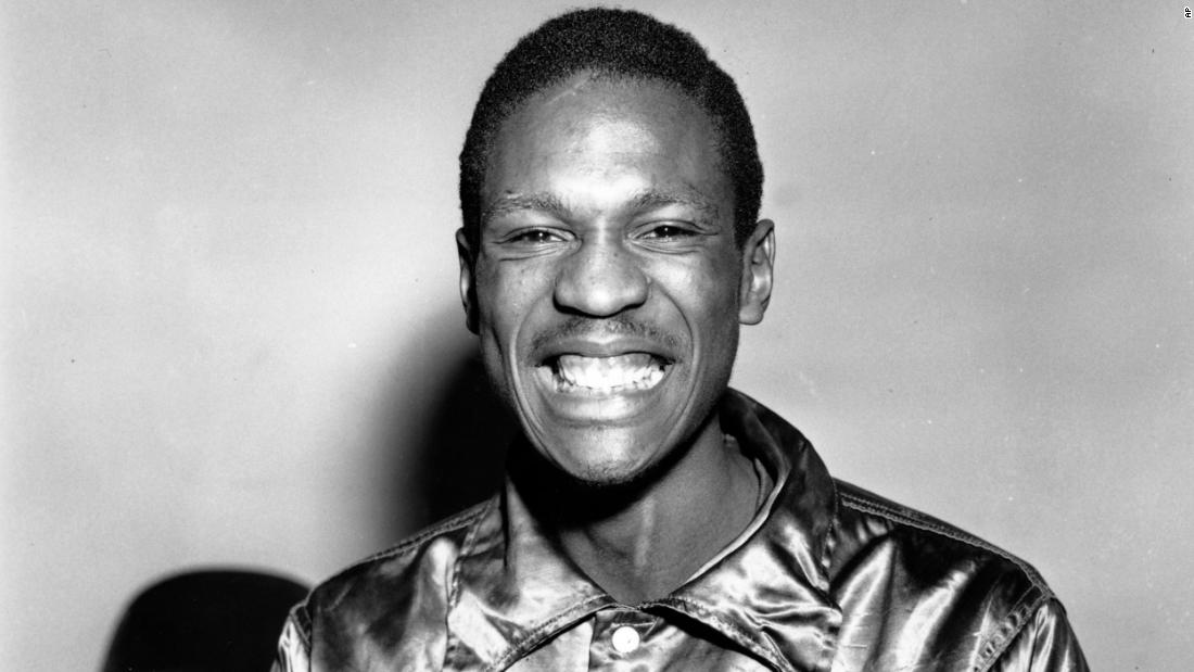 Russell poses in San Francisco in 1955. The 6-foot-9 center was known for his defense and skill in blocking shots.