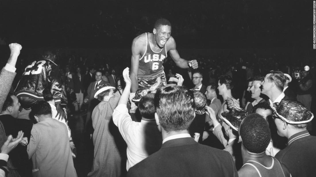 Russell is lifted up by fans after the USF Dons won the NCAA title in Kansas City, Missouri, in 1955. &lt;br /&gt;