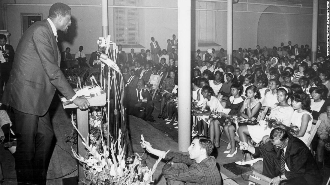 Russell speaks about segregation during the Freedom Graduation at Patrick T. Campbell Jr. High School in Boston, Massachusetts, in June 1966. Russell was an outspoken supporter of civil rights.