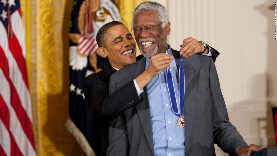 Then-President Barack Obama awards Russell the Presidential Medal of Freedom during a ceremony at the White House in Washington, DC, in February 2011.