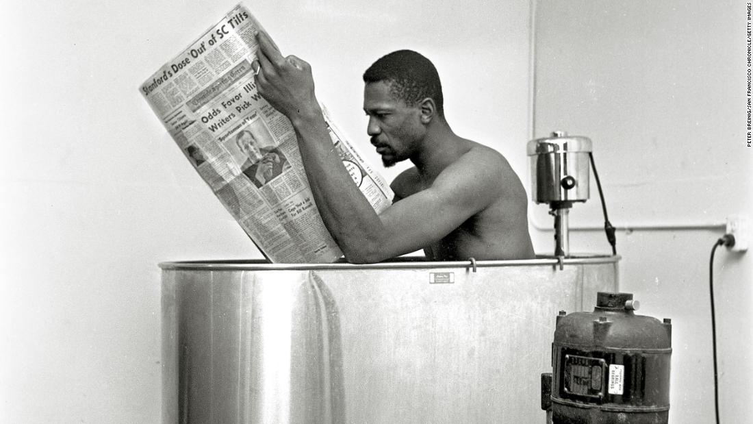 Russell relaxes in a whirlpool bath following a Celtics practice in San Francisco, California, in December 1963. 