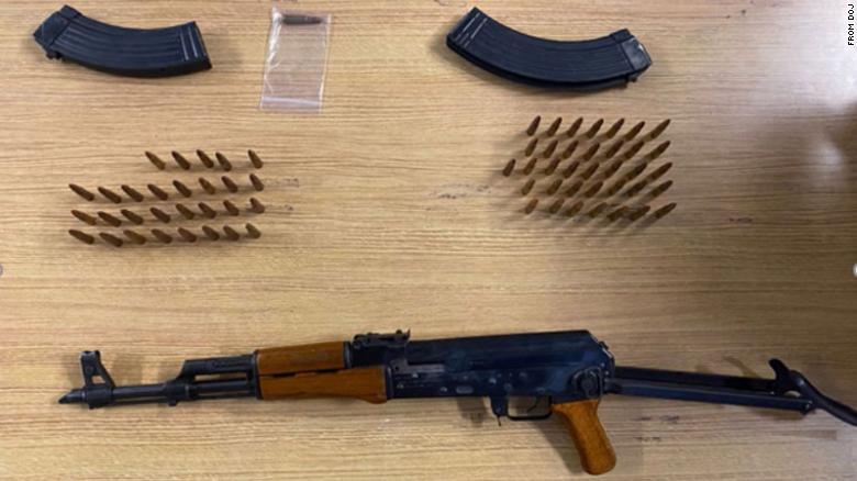 Law enforcement found a suitcase containing a loaded AK-47-style rifle, a second magazine and $1,100 in the backseat of Mehdiyev&#39;s vehicle, according to a criminal complaint. 