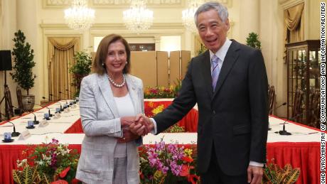 US House Speaker Nancy Pelosi shakes hands with Singapore&#39;s Prime Minister Lee Hsien Loong in Singapore on August 1.