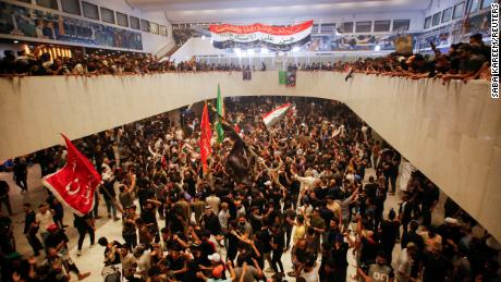 Supporters of populist leader Moqtada al-Sadr gather during a sit-in at Iraq&#39;s parliament in Baghdad on July 31. 