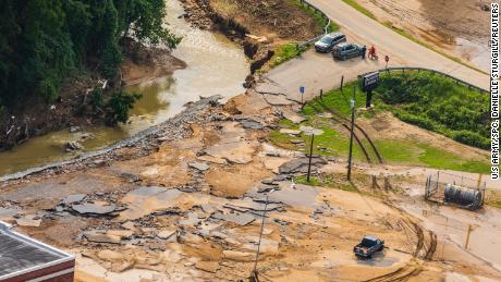 A Kentucky Army National Guard helicopter crew surveys flood damage in eastern Kentucky Saturday.