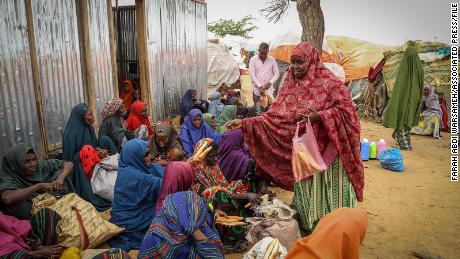 Somalis fleeing drought-stricken areas receive food donations from the city's residents.