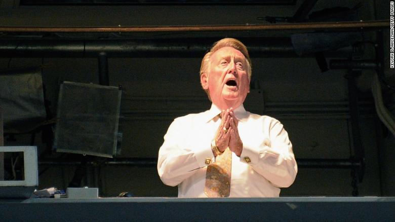 Vin Scully sings &quot;Take Me Out to the Ball Game&quot; during the seventh inning of a game between the Arizona Diamondbacks and the Los Angeles Dodgers on September 14, 2011.