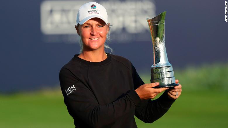 Nordqvist poses with the Open trophy after victory at Carnoustie in Scotland, 2021.