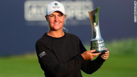Nordqvist poses with the Open trophy after winning at Carnoustie in Scotland, 2021.