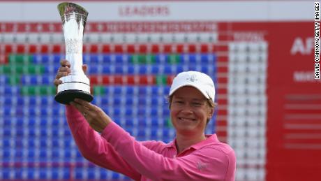Matthew holds the trophy aloft after her Open win at Royal Lytham St Annes Golf Club, England in 2009.