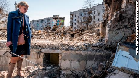 Rep. Victoria Spartz surveys damage to buildings in Bucha, Ukraine, on April 14, 2022. (Daniel Berehulak/The New York Times)