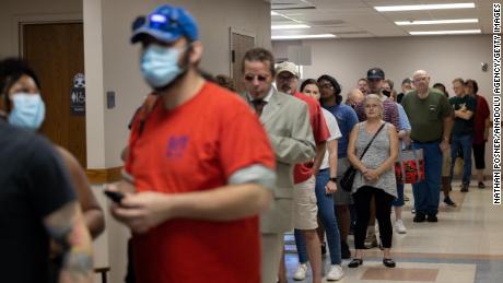 Voters wait in line at the Covenant Presbyterian Church in Wichita, Kansas on August 2, 2022. 