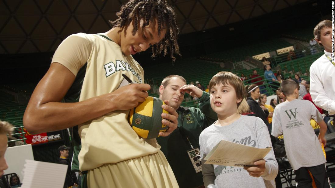 Griner #42 of Baylor University signs autographs after a game against Louisiana Tech.