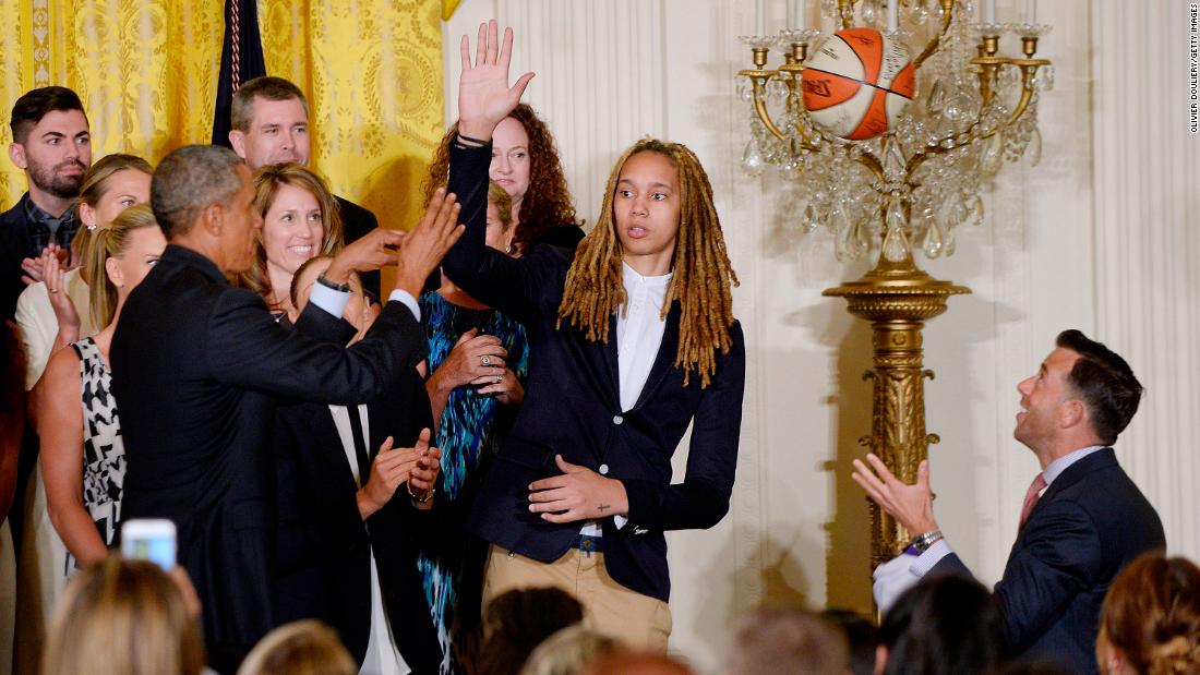 President Barack Obama gets a high five from Griner in the East Room at the White House in August 2015. Obama was honoring the Phoenix Mercury players for their victory in the 2014 WNBA Finals. 