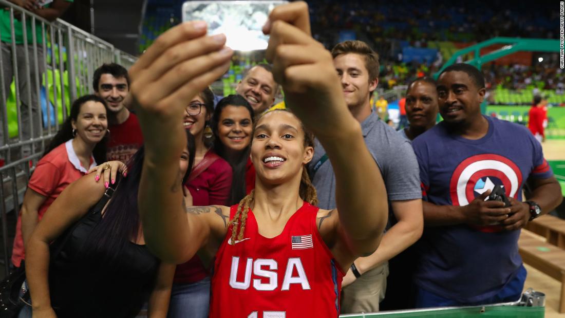 Griner poses for a selfie with fans in August 2016.