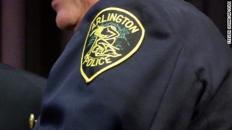 An Arlington Police patch is seen on an officer&#39;s uniform. 