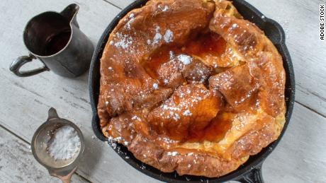 Use a skillet to puff up a dutch baby in the oven before the pancake deflates into a bowl-shaped batter.