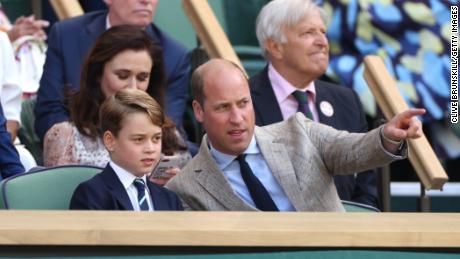 George and William watch the men's final Wimbledon singles match on July 10.