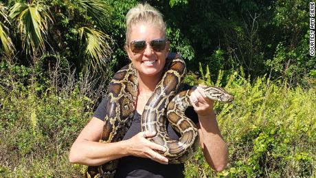 "I love snakes.  I hate that we have to do this, but they're invasive and changing the entire ecosystem."  Amy Siewe told CNN.
