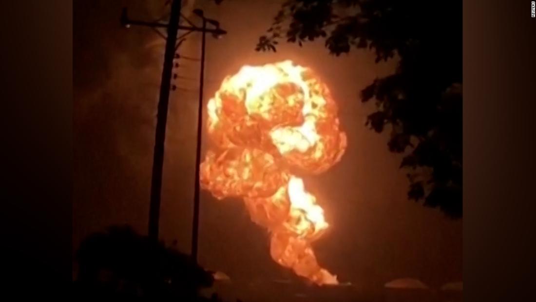 Video captures oil tank exploding into massive fireball – CNN Video