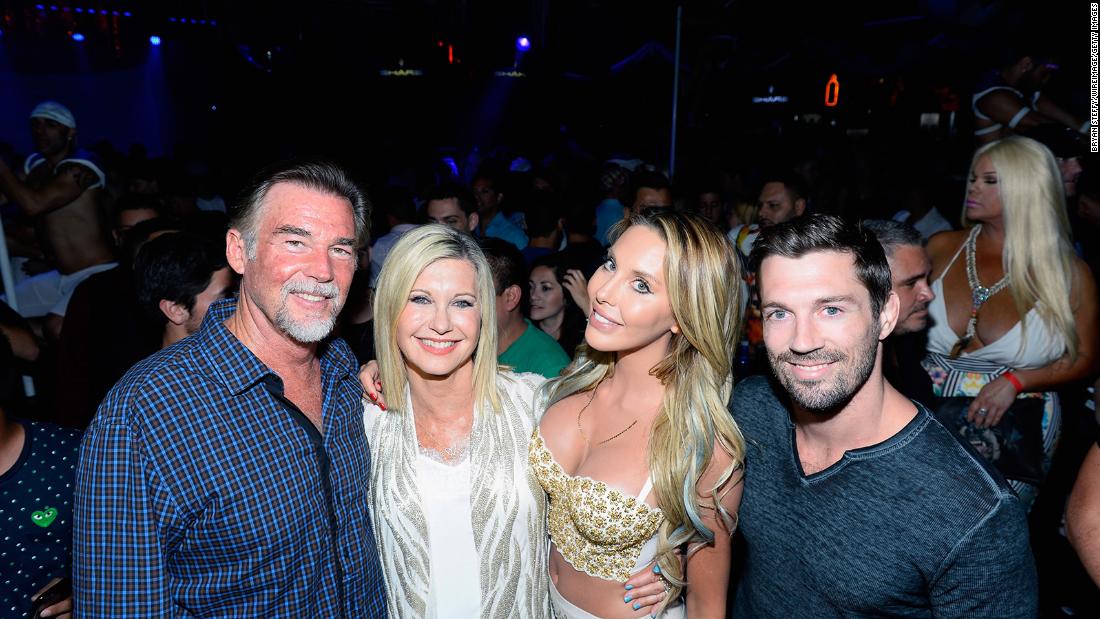 Newton-John poses with her second husband, John Easterling; her daughter, Chloe Lattanzi; and Chloe&#39;s fiance, James Driskill, in 2015. They were attending an event celebrating the 35th anniversary of &quot;Xanadu.&quot;