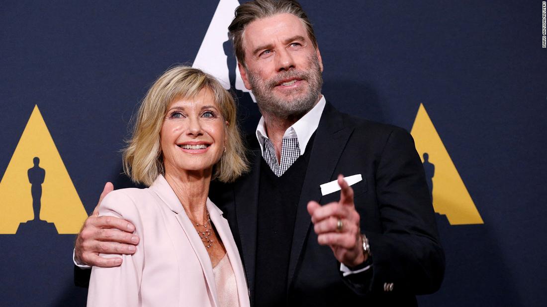 Newton-John and Travolta attend a 40th anniversary screening of &quot;Grease&quot; in 2018.