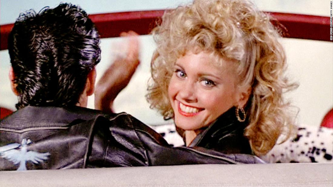 Olivia Newton-John waves goodbye in the 1978 movie &quot;Grease.&quot;