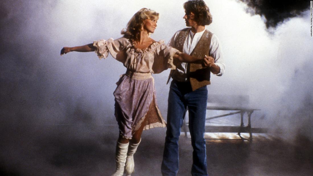 Newton-John appears with Andy Gibb in the 1980 film &quot;Xanadu.&quot; The musical fantasy bombed at the box office, but its soundtrack sold well and spawned &quot;Magic,&quot; a No. 1 hit.