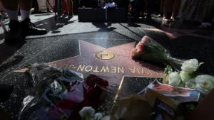 The star of late actor Olivia Newton-John is adorned with flowers and photographs on the Hollywood Walk of Fame in Los Angeles, California, U.S., August 8, 2022. REUTERS/Mario Anzuoni