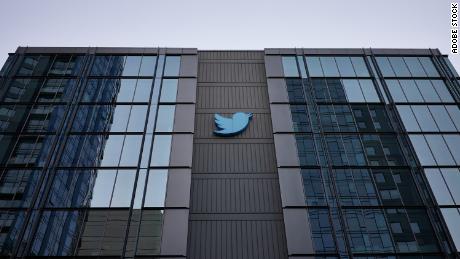 The Twitter logo is seen at Twitter's Headquarters in San Francisco, California, in the evening.