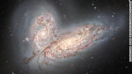 New image of colliding galaxies previews the fate of the Milky Way.
