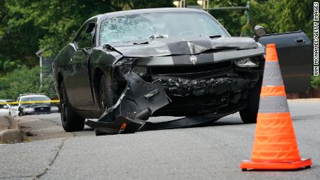 The car that allegedly plowed through a crowd of protestors marching through a downtown shopping district was stopped by police several blocks away August 12, 2017 in Charlottesville, Virginia. 