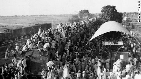Muslim refugees crowd onto a train bound for Pakistan, as it leaves the New Delhi, India area, September 1947. 