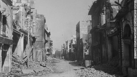 The burned-out Hall Bazaar shopping hub in Amritsar, Punjab, during the Partition of India, 1947. Fighting took place between the city's Muslim, and Sikh and Hindu residents.  